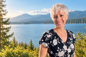 Smiling Woman by the Mountain Lake